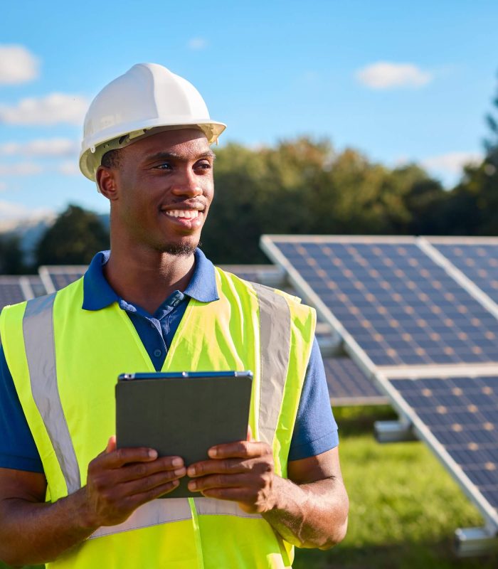 portrait-of-male-engineer-with-digital-tablet-inspecting-solar-panels-generating-renewable-energy.jpg